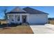 Charming one-story home with a two-car garage and beautiful landscaping at 619 Culmen Ct., Myrtle Beach, SC 29588