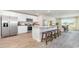 Modern kitchen featuring stainless steel appliances, granite counters and a spacious island at 619 Culmen Ct., Myrtle Beach, SC 29588