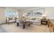 Bright living room featuring neutral decor, cozy seating, and natural light at 619 Culmen Ct., Myrtle Beach, SC 29588