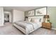 Serene main bedroom with calming colors, stylish furnishings, and plush carpeting at 619 Culmen Ct., Myrtle Beach, SC 29588