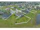 Aerial view of a well-manicured single-Gathering home with fenced yard at 713 Garland Ct., Myrtle Beach, SC 29588