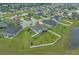 Aerial view of a well-manicured single-Gathering home with fenced yard at 713 Garland Ct., Myrtle Beach, SC 29588