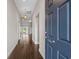 View of a bright and inviting foyer with dark wood floors and tray ceiling at 713 Garland Ct., Myrtle Beach, SC 29588