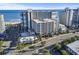 Aerial view of condo with beachfront access, parking garage, outdoor pool, and beautiful ocean views at 7200 N Ocean Blvd. # 431, Myrtle Beach, SC 29572