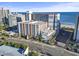 Elevated view of condos, beach access, and parking, highlighting proximity to the ocean and local attractions at 7200 N Ocean Blvd. # 431, Myrtle Beach, SC 29572