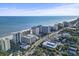 Beautiful aerial view of a coastal property featuring multiple high-rise buildings, a beach, and scenic ocean views at 7200 N Ocean Blvd. # 431, Myrtle Beach, SC 29572