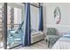 Cozy balcony featuring blue Adirondack chairs, ocean views, and serene outdoor seating at 7200 N Ocean Blvd. # 431, Myrtle Beach, SC 29572