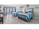 Bright bedroom featuring two beds, access to a balcony, and coastal-themed decor at 7200 N Ocean Blvd. # 431, Myrtle Beach, SC 29572