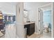 Corner wet bar adjacent to the bathroom, featuring a granite countertop and storage, for guests at 7200 N Ocean Blvd. # 431, Myrtle Beach, SC 29572