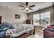 Comfortable bedroom featuring a ceiling fan and natural light streaming through the window at 777 Woodland Farms Circle, Aynor, SC 29511