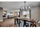 Open-concept living and dining area with sliding door access to the outdoor patio at 777 Woodland Farms Circle, Aynor, SC 29511