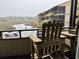 Private balcony with chairs and great views of a marsh at 9501 Shore Dr. # D-237, Myrtle Beach, SC 29572