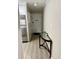 Hallway view with beach access, leading to a modern kitchen at 9501 Shore Dr. # D-237, Myrtle Beach, SC 29572