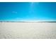 Expansive beach view with white sand and clear blue sky, perfect for relaxation and recreation at 9550 Shore Dr. # 531, Myrtle Beach, SC 29572