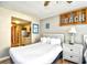 Bright bedroom featuring two beds with a view into the kitchen at 9550 Shore Dr. # 531, Myrtle Beach, SC 29572