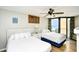 Bright bedroom with two beds and balcony access, offering beach views at 9550 Shore Dr. # 531, Myrtle Beach, SC 29572
