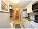 Efficient kitchen features a full-size refrigerator and essential appliances for convenient meal preparation at 9550 Shore Dr. # 531, Myrtle Beach, SC 29572