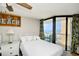 Cozy bedroom featuring balcony access with great ocean views, providing a serene retreat at 9550 Shore Dr. # 531, Myrtle Beach, SC 29572