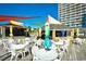 Outdoor restaurant area with umbrellas, tables and chairs at 9550 Shore Dr. # 531, Myrtle Beach, SC 29572