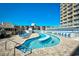Zero-entry pool with lounge chairs and a poolside bar in a resort setting at 9550 Shore Dr. # 531, Myrtle Beach, SC 29572