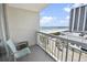 Cozy balcony with chairs offering stunning views of the beach and the ocean at 9820 Queensway Blvd. # 704, Myrtle Beach, SC 29572