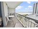 Spacious balcony featuring outdoor seating and beautiful views of the beach and ocean at 9820 Queensway Blvd. # 704, Myrtle Beach, SC 29572