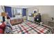 Comfortable bedroom featuring two beds, balcony access and a chest of drawers with tv at 9820 Queensway Blvd. # 704, Myrtle Beach, SC 29572