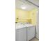 Functional laundry room featuring a washing machine and dryer for added convenience at 9820 Queensway Blvd. # 704, Myrtle Beach, SC 29572