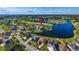 Waterfront community aerial view highlighting lakefront houses, golf course and luxurious amenities at 1017 Gallinule Dr., Conway, SC 29526