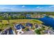 Aerial view of a community with a lake and golf course, showcasing luxurious homes at 1017 Gallinule Dr., Conway, SC 29526