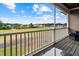 Serene balcony with picturesque golf course and lake views, offering a relaxing outdoor experience at 1017 Gallinule Dr., Conway, SC 29526