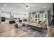 Open concept living area seamlessly integrates kitchen, dining, and living spaces for easy entertaining at 1017 Gallinule Dr., Conway, SC 29526