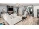 Spacious living room with a fireplace, comfortable seating, and a staircase leading to the upper level at 1017 Gallinule Dr., Conway, SC 29526