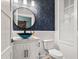 Stylish powder room with a unique vanity, elegant mirror, and modern fixtures at 1017 Gallinule Dr., Conway, SC 29526