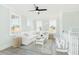 Charming sitting room with comfortable seating, natural light, a nautical theme, and light neutral decor at 1071 Milford Way, Myrtle Beach, SC 29588