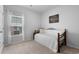 Well-lit bedroom featuring a daybed with pillows and artwork on the wall at 109 River Vista Way, Myrtle Beach, SC 29588