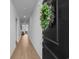 Inviting entryway features a welcoming door wreath and long hallway leading to the living area at 109 River Vista Way, Myrtle Beach, SC 29588