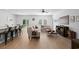 Bright living room boasts natural light, modern furnishings, and wood-look flooring at 109 River Vista Way, Myrtle Beach, SC 29588