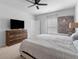 Comfortable main bedroom featuring a ceiling fan, dresser, and calm color scheme at 109 River Vista Way, Myrtle Beach, SC 29588