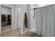 Shower featuring a showerhead and patterned shower curtain at 109 River Vista Way, Myrtle Beach, SC 29588