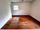 This is a basic bedroom with walls painted off white, one window, and a closet space at 1110 Scott Dr., Myrtle Beach, SC 29577