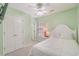Cozy bedroom with a white bed, carpet flooring, and a window providing natural light at 118A 6Th Ave. N, Surfside Beach, SC 29575