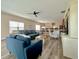 Spacious living room features stylish furniture, wood flooring, and a bright, open floor plan at 118A 6Th Ave. N, Surfside Beach, SC 29575
