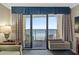 Balcony view featuring ocean views, comfortable seating, and natural light at 1200 N Ocean Blvd. # 710, Myrtle Beach, SC 29577