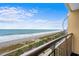 Scenic balcony view overlooking the beach and a Ferris wheel in the distance, perfect for relaxation at 1200 N Ocean Blvd. # 710, Myrtle Beach, SC 29577