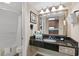 Clean bathroom with granite countertops, vanity mirror, and bathtub-shower combination at 1200 N Ocean Blvd. # 710, Myrtle Beach, SC 29577