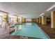Inviting indoor pool area with clear water, brick flooring, and ample lounge space at 1200 N Ocean Blvd. # 710, Myrtle Beach, SC 29577