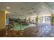 Inviting indoor pool with clear water, lush greenery, and a tranquil ambiance, perfect for relaxation at 1200 N Ocean Blvd. # 710, Myrtle Beach, SC 29577