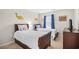 Shared bedroom featuring two twin beds, dinosaur themed decorations, and natural light from the window at 1204 River Oak Dr. # 25-A, Myrtle Beach, SC 29579