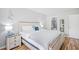 Serene bedroom with a beachy aesthetic, featuring a comfortable bed and charming decor, offering a peaceful retreat at 1204 River Oak Dr. # 25-A, Myrtle Beach, SC 29579
